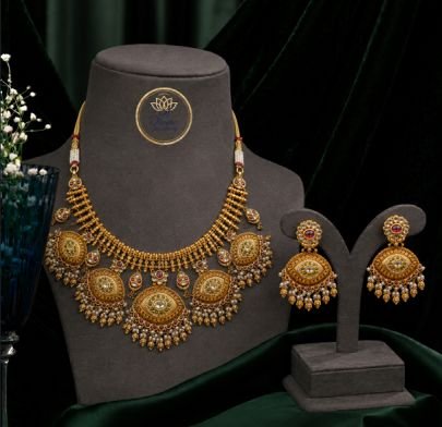 Antique Gold Laxmi Eye Motif Necklace Set with Pearl Droplets & Kemp Stones | Divine Jewellery