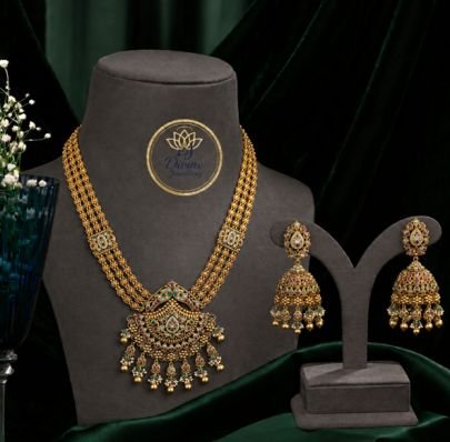 Antique Gold Three-Strand Nakshi Necklace Set with Grand Jhumkas | Divine Jewellery