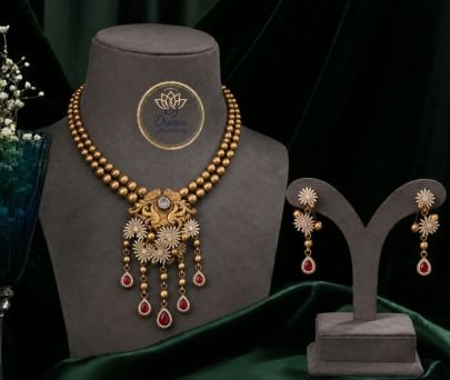 Divine Antique Gold-Plated Silver Floral Pendant Necklace Set with Ruby Drops & Matching Earrings | Traditional Designer Jewellery