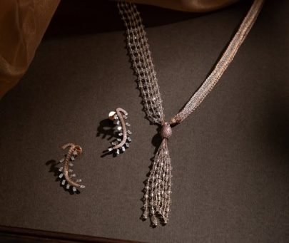 Divine Jewellery Elegant Tassel Lariat Necklace Set with Sparkling Stone Chain and Designer Curved Earrings