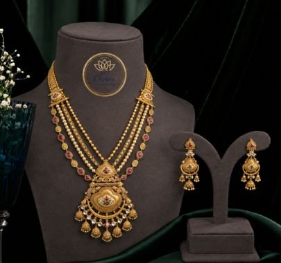 Divine JewelleryRoyal Antique Gold-Plated Layered Necklace Set with Kundan Pendant & Jhumka Earrings