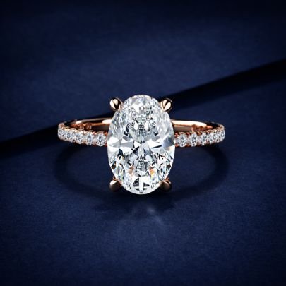 Luxurious Oval Cut Diamond Engagement Ring in Rose Gold – Hidden Halo Pave Band